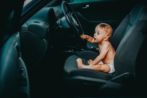 Can a baby sit in outlet front seat of car