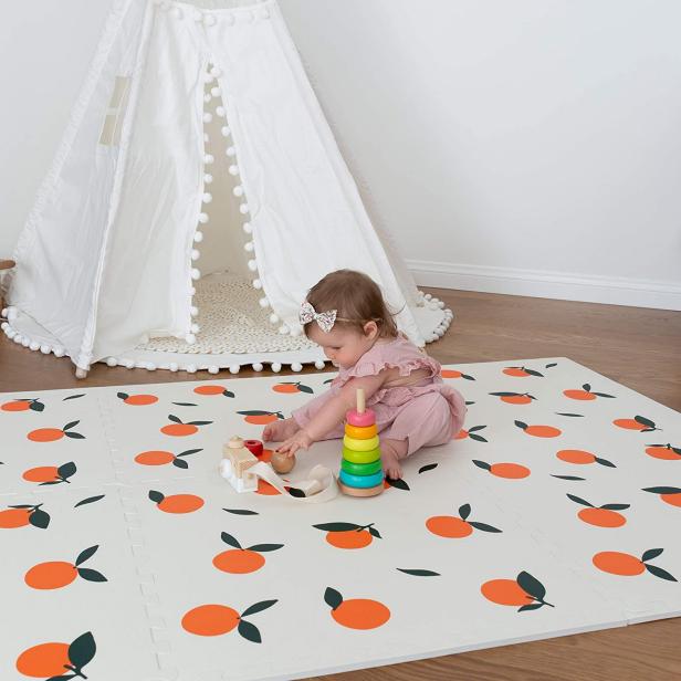 Baby playing on playmat