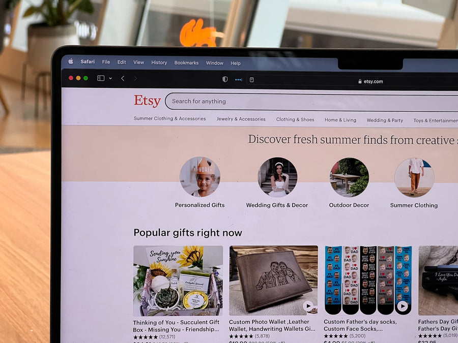  A computer screen shows the webpage “Etsy” on the homepage