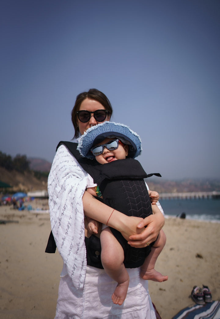 Mom with baby at the beach