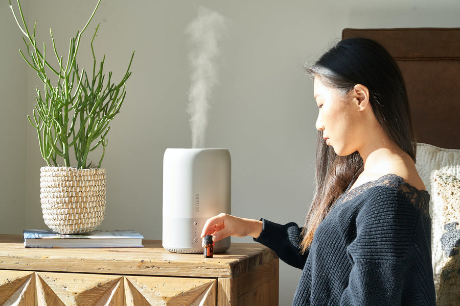 Woman setting up a humidifier