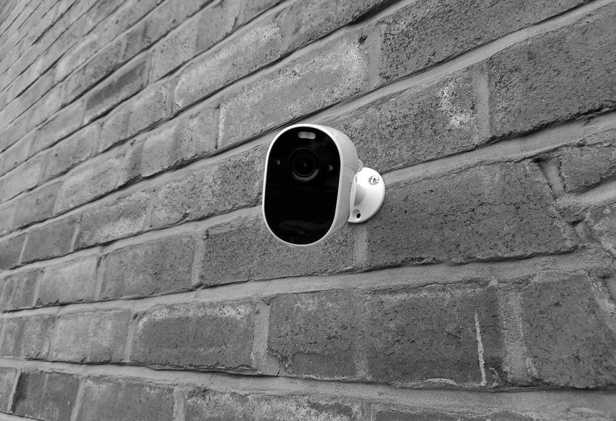 Surveillance Camera on a Brick Wall