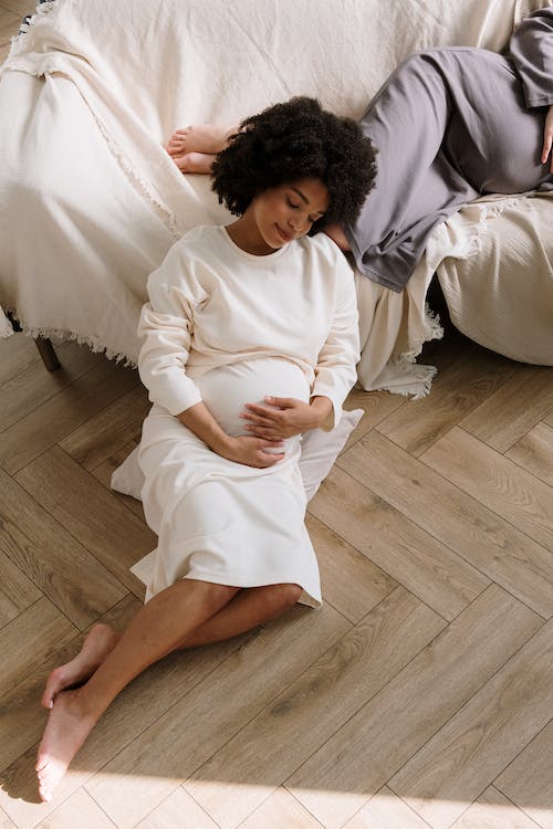  Pregnant woman on floor