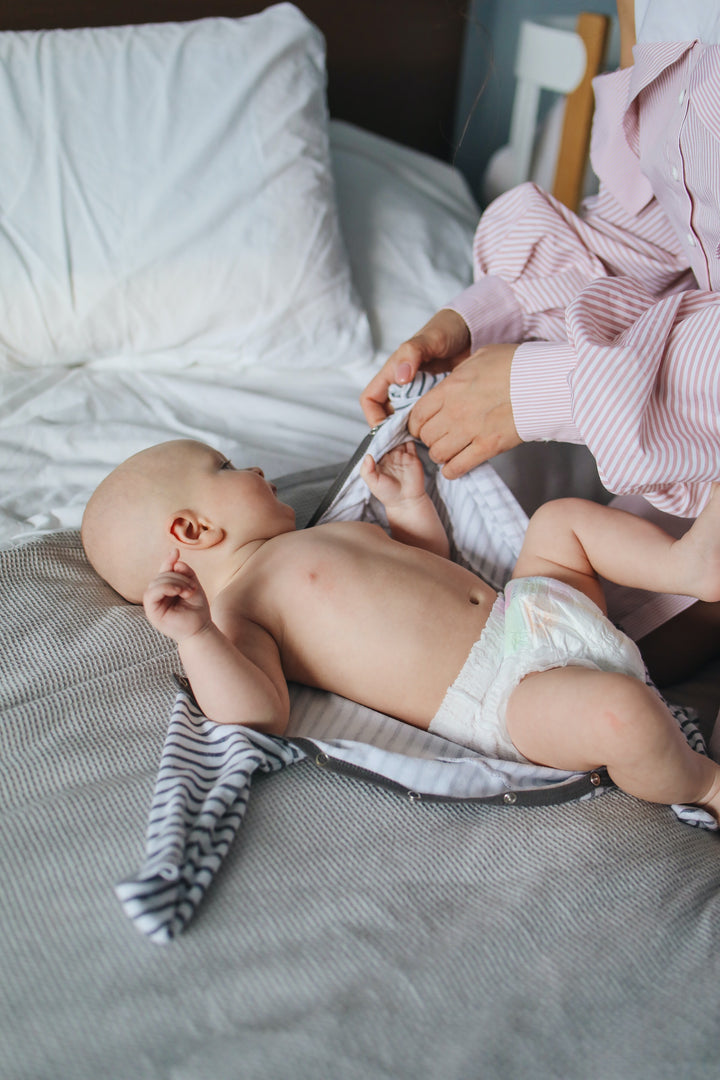 Baby getting dressed