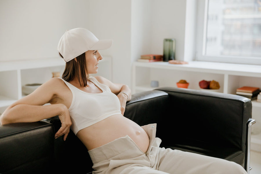  pregnant woman in light casual clothes