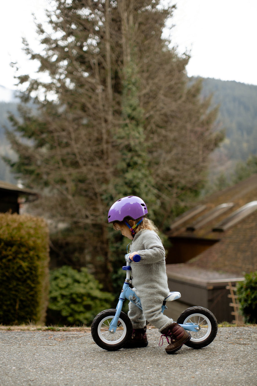  a child on a balance bike
