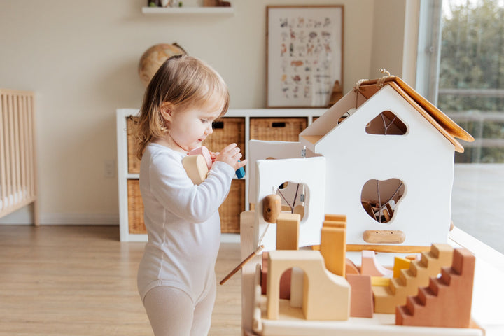 Baby holding building blocks toys