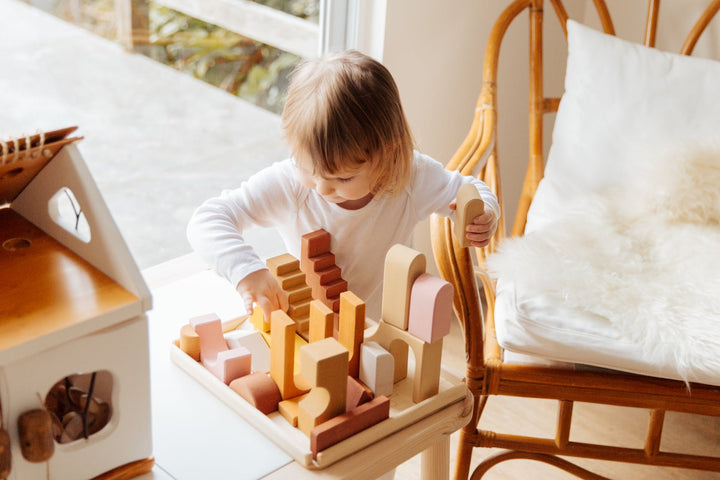 a child playing with blocks