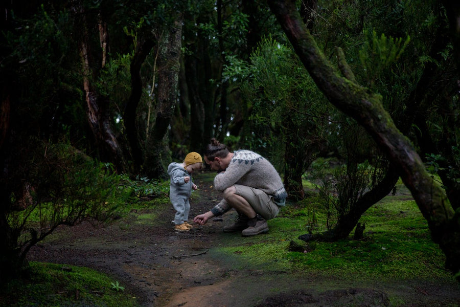 dad and baby in the forest