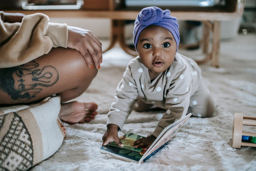 baby with a book