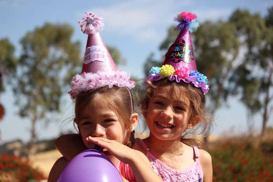 photo of two young kids celebrating their birthday